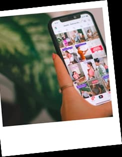 Creator browsing social media on phone