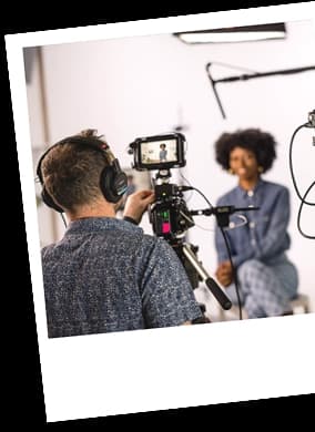 Videographer filming a creator